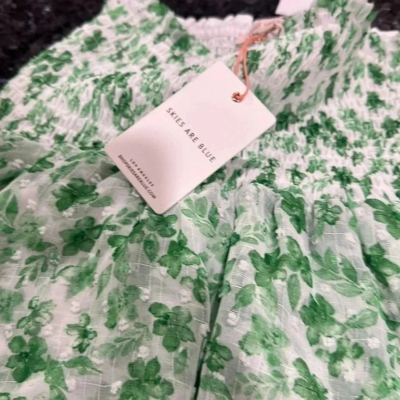 Skies are blue Floral Smocked Waist Mini Skirt - Picture 5 of 6